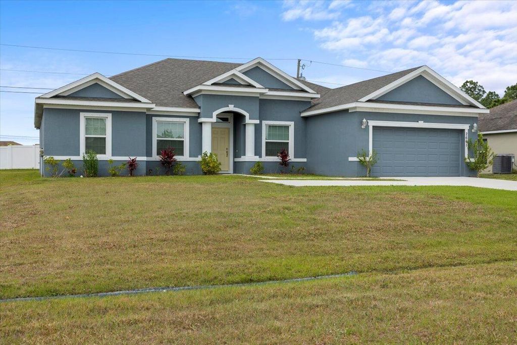 Photo of 2661 SW Import Drive, Port St Lucie, FL 34987 (MLS # R11100623)