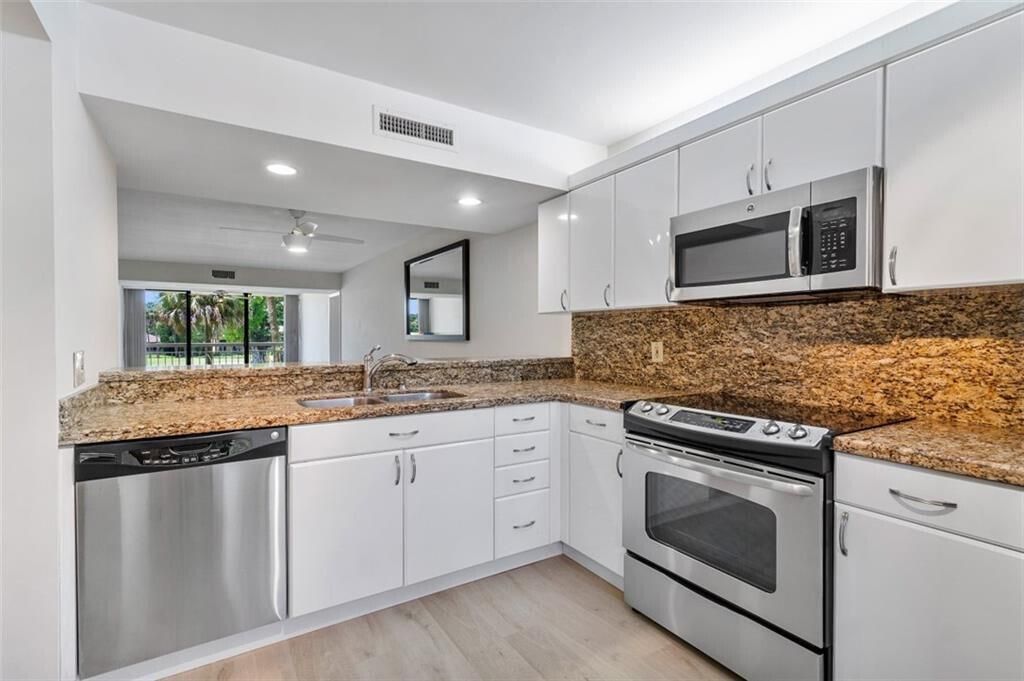 Photo of 6181 Balboa Circle #201, Boca Raton, FL 33433 (MLS # R11098915)