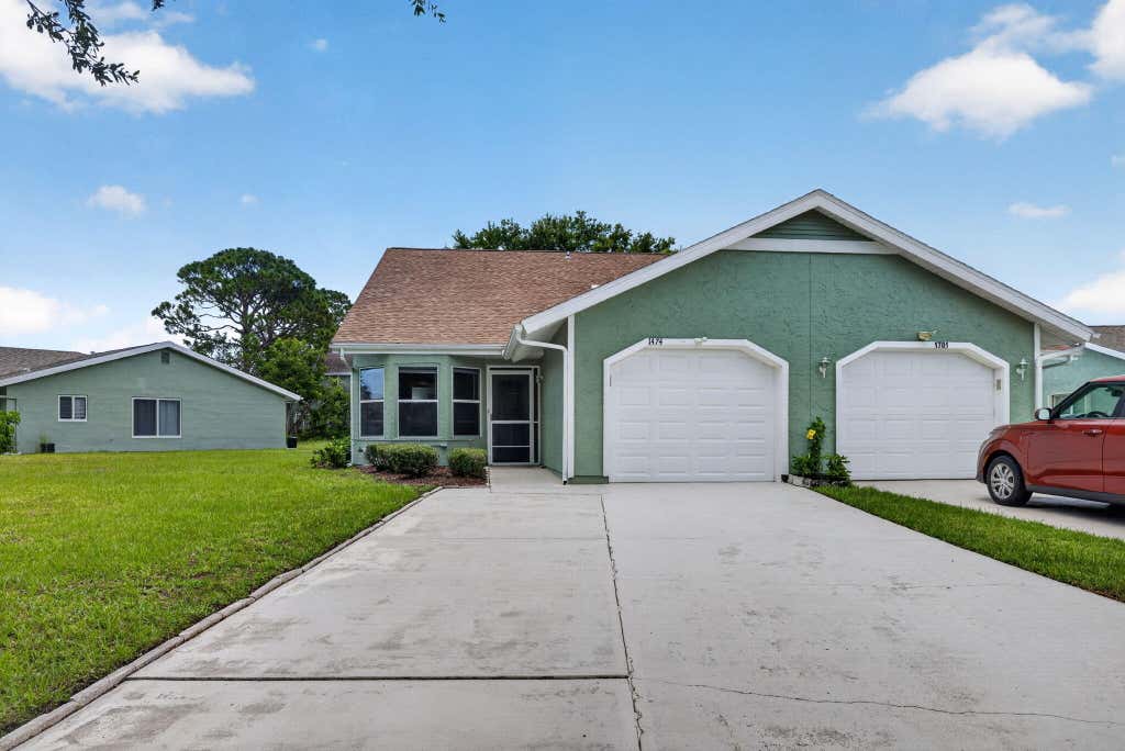 Photo of 1474 SE Rivergreen Circle, Port Saint Lucie, FL 34952 (MLS # B26049708)