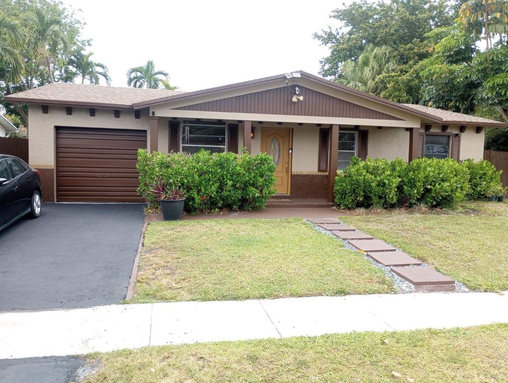 Photo of 8241 SW 4th Court, North Lauderdale, FL 33068 (MLS # B26014992)