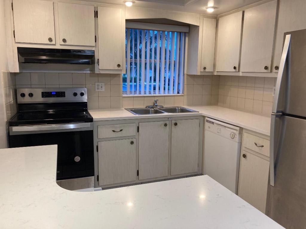 Photo of 2894 Crosley Drive E #J, West Palm Beach, FL 33415 (MLS # R11140039)