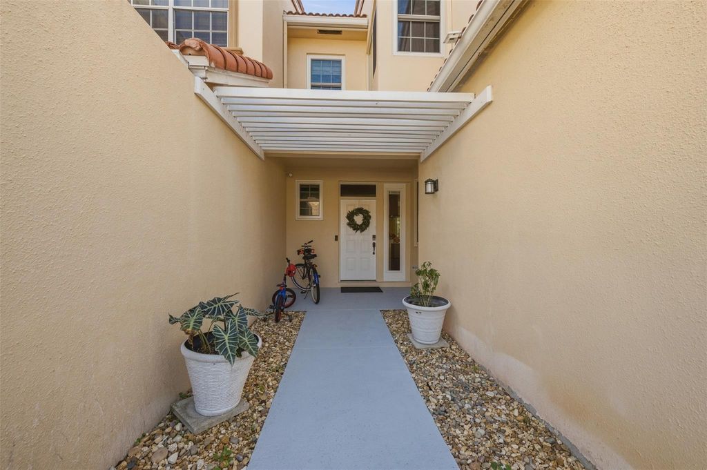 Photo of 9788 Royal Palm Boulevard, Coral Springs, FL 33065 (MLS # F10549234)