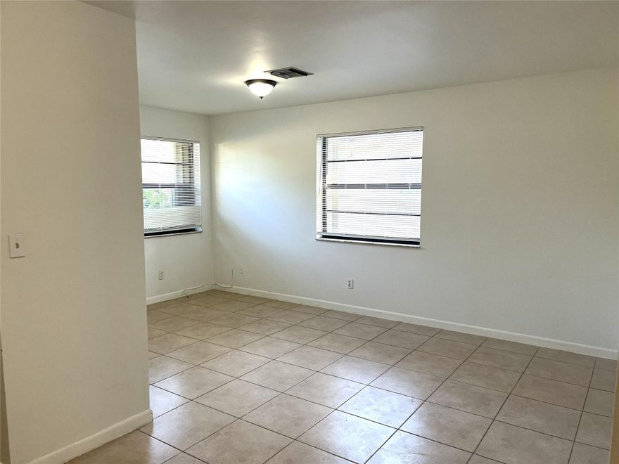 Beautiful and updated cozy 1-bedroom, 1 bath corner unit in a multi-family property with no HOA! Unit #1 is freshly painted throughout, new bathroom floor, vanity, and fixtures, new kitchen countertop and a spacious bedroom with updated fixtures (new ceiling fan and blinds). Rent includes water, trash, and sewage. First month's rent and a security deposit are required to move in. Conveniently located near State Road 7/441 and Florida’s Turnpike, with easy access to shopping centers, supermarkets, and restaurants. Bring all offers!