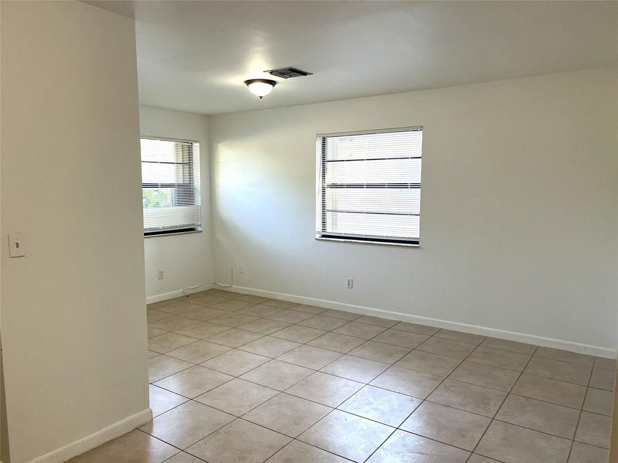 Beautiful and updated 1-bedroom, 1 bath corner unit with no HOA! Unit #1 is freshly painted throughout, new bathroom floor, vanity, and fixtures, new kitchen countertop and a spacious bedroom with updated fixtures (new ceiling fan and blinds). Rent includes water, trash, and sewage. First month's rent and a security deposit are required to move in. Conveniently located near State Road 7/441 and Florida’s Turnpike, with easy access to shopping centers, supermarkets, and restaurants. Bring all offers!