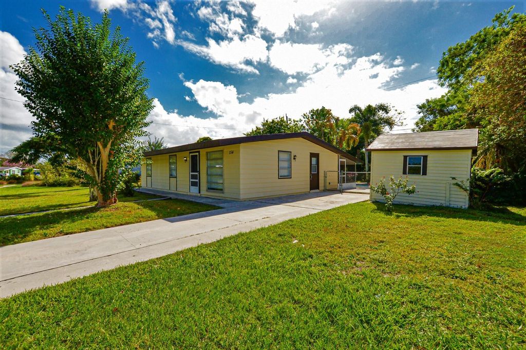 Photo of 154 SE Lucero Drive, Port Saint Lucie, FL 34983 (MLS # R10932757)