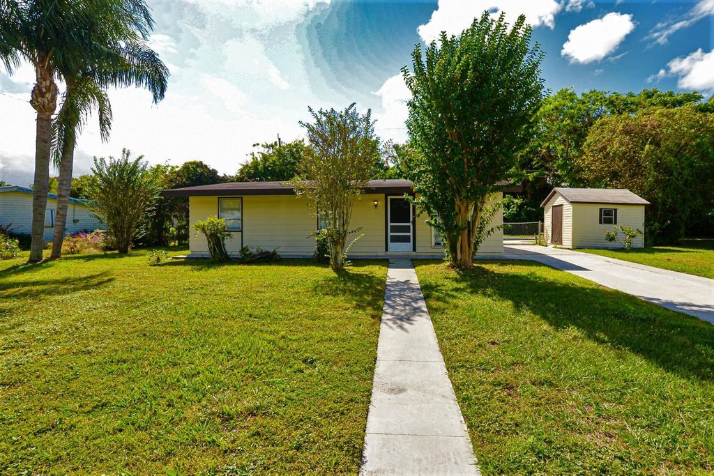 Photo of 154 SE Lucero Drive, Port Saint Lucie, FL 34983 (MLS # R10932757)