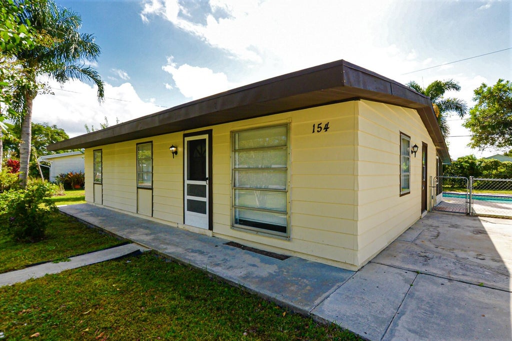 Photo of 154 SE Lucero Drive, Port Saint Lucie, FL 34983 (MLS # R10932757)