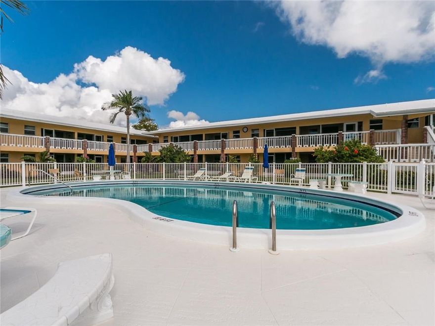 READY TO MOVE-IN! Fabulous top floor unit, remodeled, tastefully decorated,sold furnished turn key ! Enjoy the view of the pool area & manicured garden from your private porch! This unit is facing south and has slidders doors installed on the balcony providing lots of natural lights inside. Open kitchen with newer cabinets, METAG appliances & granite countertop. Recessed lighting in kitchen & living rm. Newer A/C and Water Heater (2016)  Well maintained wood floor throught. Wine cooler. Impact windows and door. New ceiling fans, interior doors,  plumbing &  lighting fixtures. Gorgeous & upgraded bath. X-Storage. Large walk-in closet in bedrm. Amenities included heat pool, bbq area, shuffleboard , laundry rm. Peacefull 55+ community, cash only. Seasonal rental allowed after one year. WOW!