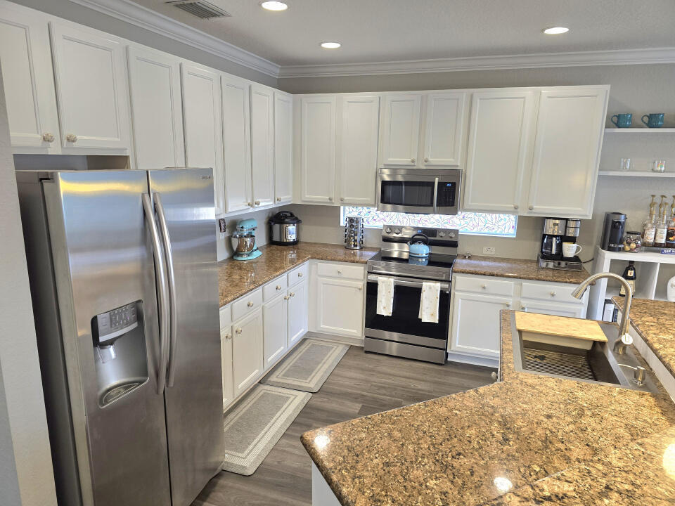 Photo of 8696 Woodgrove Harbor Lane, Boynton Beach, FL 33473 (MLS # B26038281)