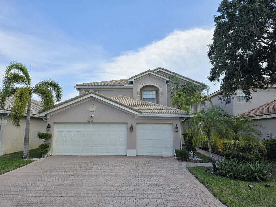 Photo of 8696 Woodgrove Harbor Lane, Boynton Beach, FL 33473 (MLS # B26038281)