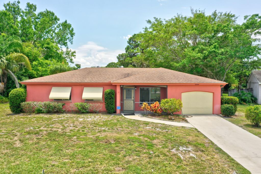 Photo of 2085 SE Talwood Lane, Port Saint Lucie, FL 34953 (MLS # R10800924)