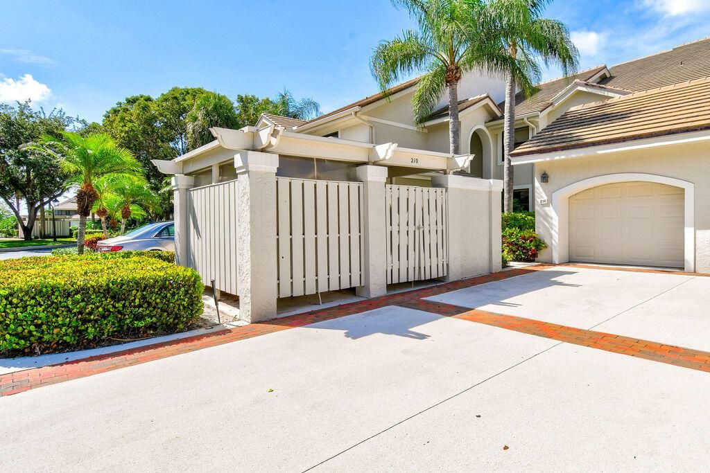 Photo of 3940 Schooner Pointe Drive Dr #210, Jupiter, FL 33477 (MLS # R10816814)