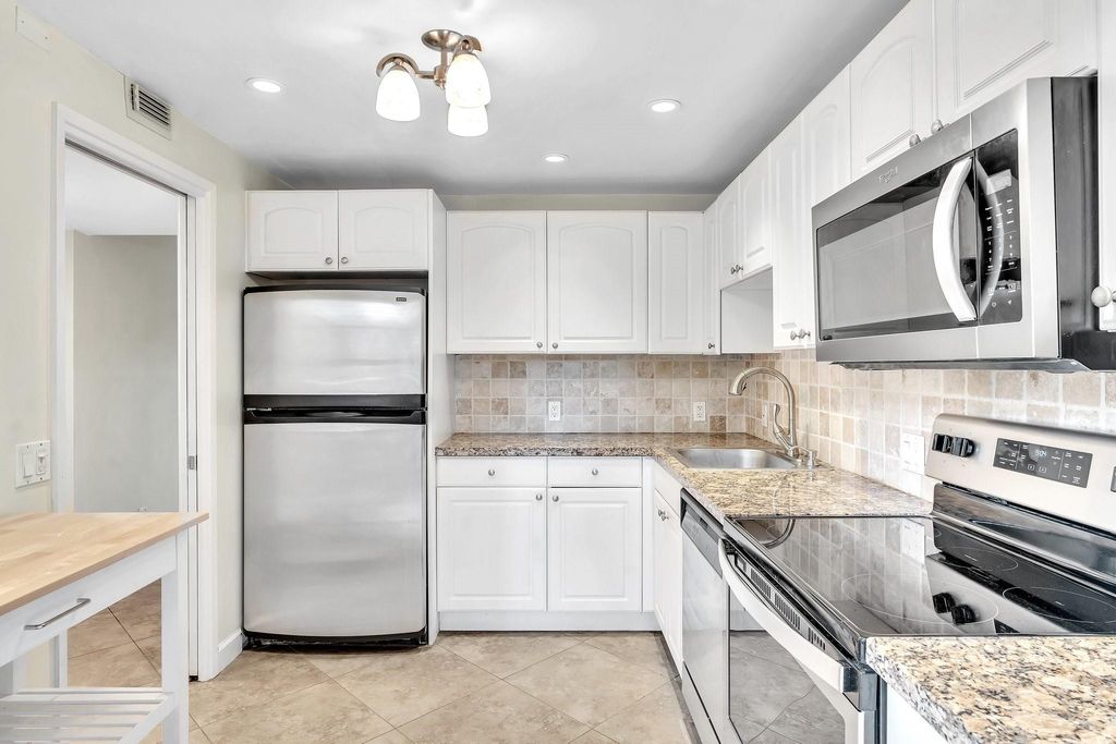 Photo of 2751 N Palm Aire Drive #104, Pompano Beach, FL 33069 (MLS # F10385648)