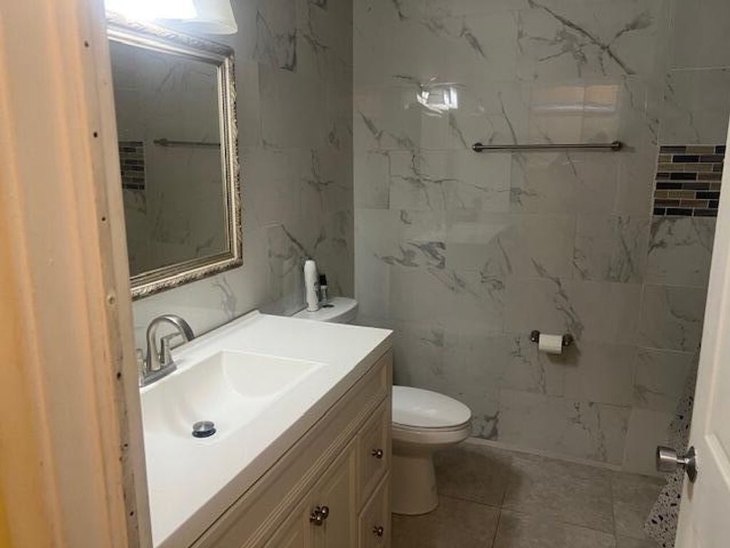 Photo of 143 W Tara Lakes Dr Drive W, Boynton Beach, FL 33436 (MLS # B26024679)
