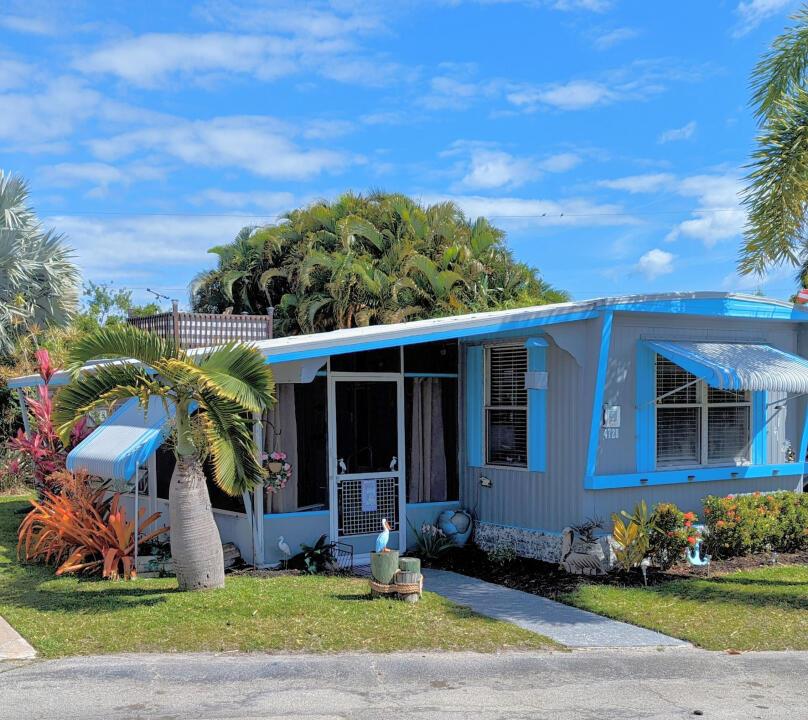 Location...Location...Jensen Beach a little hidden gem. Tucked between Port St. Lucie and Stuart there is a SMALL self-owned park called Blue Heron. This co-op is right on the intercoastal waterway with its own fishing dock and pool with tiki bar. Watch the dolphins jump and play as you relax by the pool. Minutes to the beach, restaurants and shopping. Move-in ready. Totally updated. You want privacy? Well you'll have it here! Kind neighbors(when they come) Fully furnished with coastal decor Very low taxes You own your own land and 1/28 share of the entire park. Inspection done on 05/09