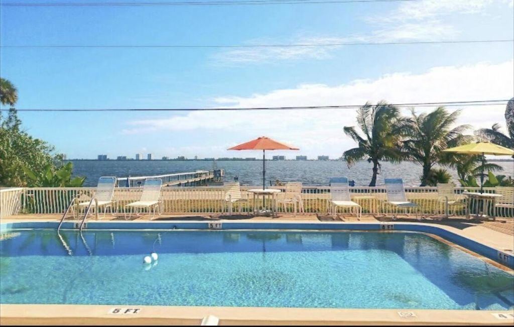 Photo of 4728 NE Blue Heron Lane, Jensen Beach, FL 34957 (MLS # R10979328)