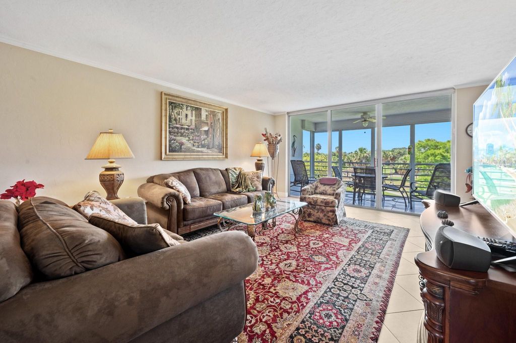 Photo of 3960 Oaks Clubhouse Drive #403, Pompano Beach, FL 33069 (MLS # F10503654)