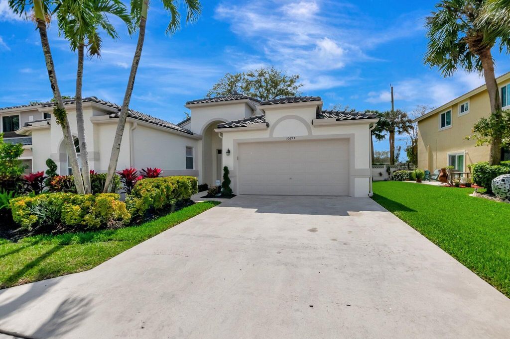 Photo of 10694 Palm Spring Drive, Boca Raton, FL 33428 (MLS # R11086463)