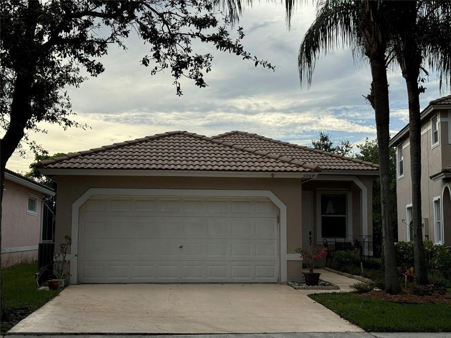 Charming 3-bedroom, 2-bath home with 2-car garage situated in serene, gated community within the Fairway Views neighborhood. This inviting residence offers a lake-side view from the patio of the rear yard crating a peaceful retreat, complemented by community amenities including a refreshing pool and relaxing sundeck.  Newer stainless-steel kitchen appliances and in-unit laundry.  Easy access to major routes such as the Florida Turnpike and I-95. Just minutes from a wide range of shopping, dining, and entertainment options.  Pet friendly (certain restrictions apply). Quick approval process.