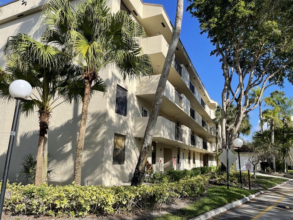 Photo of 3150 NW 42nd Avenue #E401, Coconut Creek, FL 33066 (MLS # B26007480)