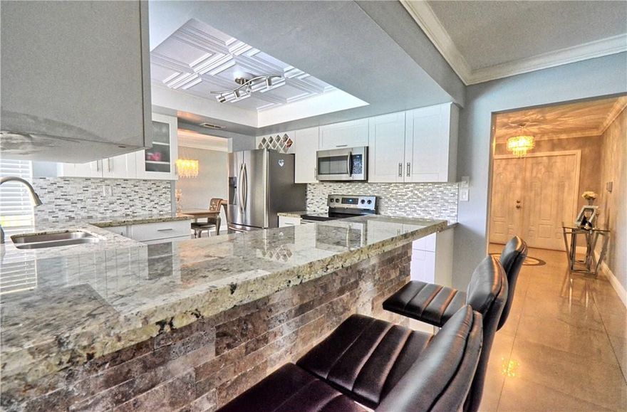 HIGH DEMEND AREA THIS IS IT! THIS WONDERFUL CORNOR LOT HOME SET WAY BACK IN THE PRIVATE NEIGBROHOOD OF SUNFLOWER IS FULLY REMOLDED WITH MODERN INSPIRATION THIS HOME FEATURES A SPLIT FLOOR PLAN 4 BED ROOMS AND 3 BATHS CROWN MOLDING WITH POOL/SPA OUT DOOR KITCHEN ADDITIONALLY FULLY REMODELED KITCHEN WITH HIGH END SS APPLIANCES THIS HOME OFFERS FRONT IMPACT WINDOWS MUST SEE THIS UNIT SEE BROKER REMARKS .