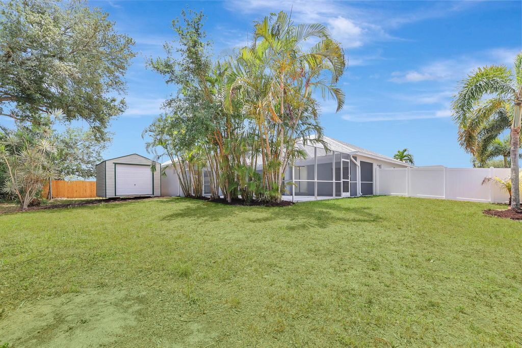 Photo of 601 SW Cynthia Street, Port Saint Lucie, FL 34983 (MLS # R10983017)