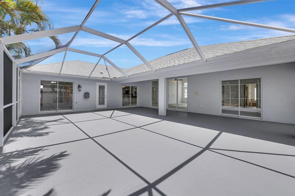 Photo of 601 SW Cynthia Street, Port Saint Lucie, FL 34983 (MLS # R10983017)