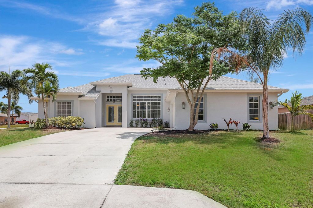 Photo of 601 SW Cynthia Street, Port Saint Lucie, FL 34983 (MLS # R10983017)