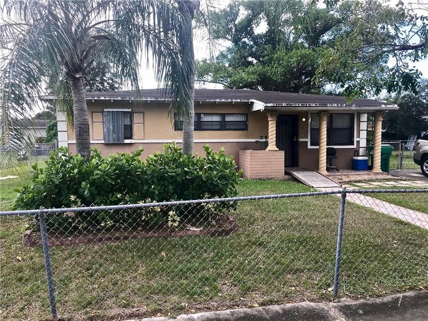 Charming 3 bedroom 1 bath home on extra large fenced lot. Front porch has decorative spiral columns.  Features include; separate laundry room, great room, updated kitchen, shed, tile & vinyl flooring in living areas and carpet in bedrooms. Kitchen has a window with views of the back yard, updated cabinets, some with glass front display, glass cook-top on range. Wainscoting in great room & dining area. Driveway is extra wide to accommodate additional parking. There is ample room on the side of the home for parking a boat / RV or similar recreation toys. Excellent property, priced to move quickly. Compare and see. Walk to Myrtle Grove Park.