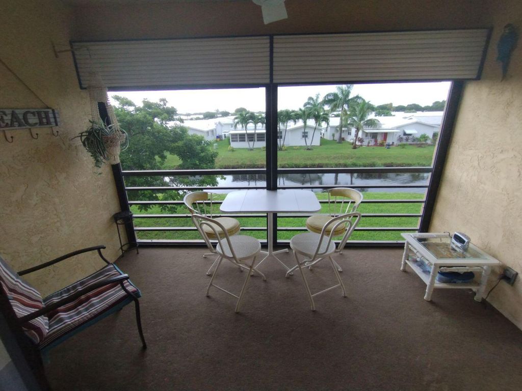 Photo of 2181 W Woolbright Road #N205, Boynton Beach, FL 33426 (MLS # R11018801)
