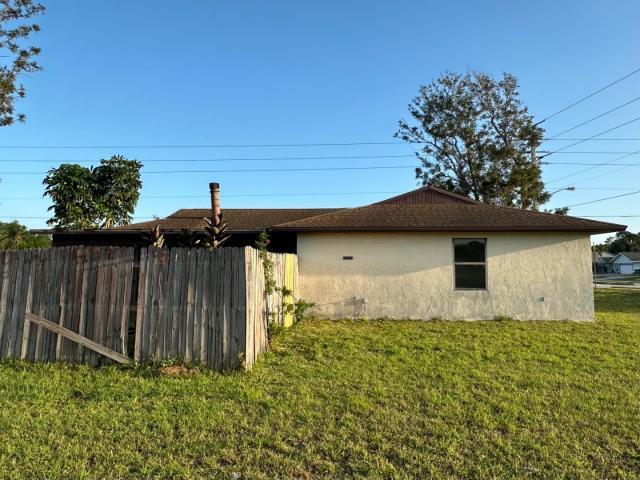 Photo of 102 SW Carter Avenue, Port Saint Lucie, FL 34983 (MLS # R10973983)