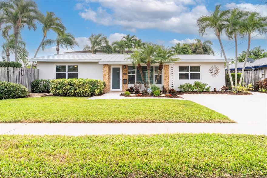 Don’t miss this immaculate, charming 2/1.5 + den, pool home in Coral Heights!  Featuring an updated kitchen with stainless steel appliances, Quartz countertops and inviting breakfast bar/counter. The open living/dining/Florida room is flooded with light, with lots of windows all around. Bonus den/office (could be a 3rd bedroom) with attached half bath. This corner yard is a tropical oasis, with resurfaced pool (2023), lush landscaping & lighting (2022), palm trees, plenty of patio areas for entertaining.  All the big stuff is done, Hurricane Impact windows/doors. A/C (2019), New metal roof/gutters (2021), Updated electrical (2022), Exterior home painted (2023). Tankless water heater, Indoor washer/dryer. Great neighborhood, close to shopping, beach, and Oakland Park Downtown District.