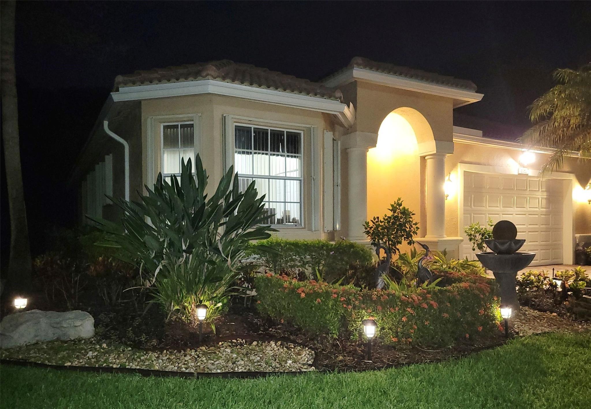 Step into this meticulously maintained 3 bedroom/2 bath waterfront home. Located in Swan's Landing, a serene part of Regency Lakes at Coconut Creek. This beautiful home is one of the largest 3/2 single story homes on the market in the subdivision. Volume ceilings. A cook's kitchen: JennAir fridge & M/W, Wolf Range, Cove D/W, LG W/D. Great water views up the canal. Bananas and mango trees, screened-in porch and fenced-in back yard perfect for the special dog in your life. This home boasts a two-year-old roof, five-year-old central A/C and new H20. Accordion shutters all around. Great two-car garage. Swan's Landing has its own pool just 113 steps away or use the clubhouse pool/hot tub, workout room, volleyball & basketball courts & kid's area. Close to schools, dining, Sawgrass Exp and more.