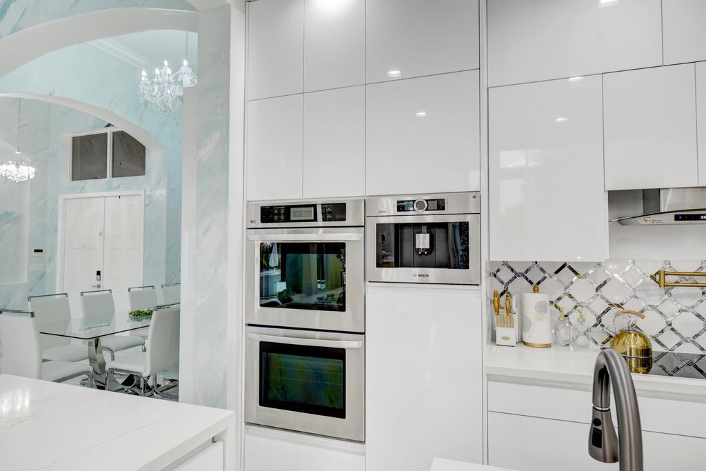 Photo of 11910 Osprey Point Circle, Wellington, FL 33449 (MLS # B26002670)