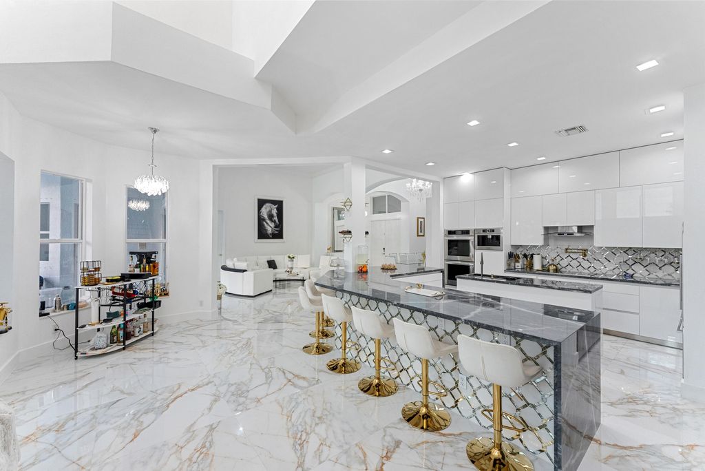 Photo of 11910 Osprey Point Circle, Wellington, FL 33449 (MLS # B26002670)