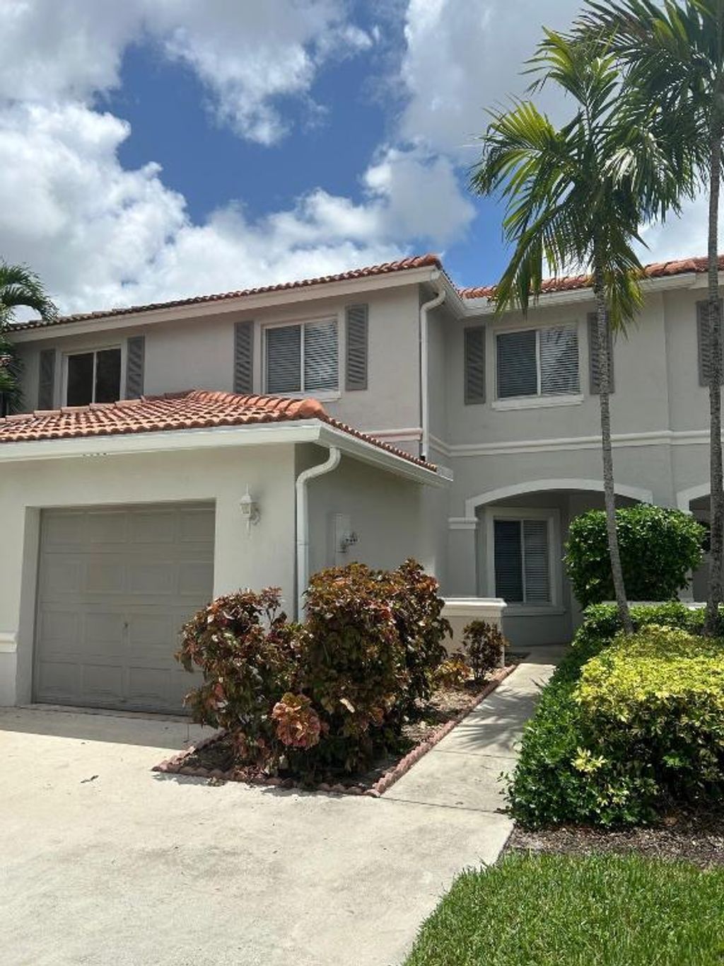 Photo of 5606 Crossing Rocks Court, Riviera Beach, FL 33407 (MLS # R10997363)