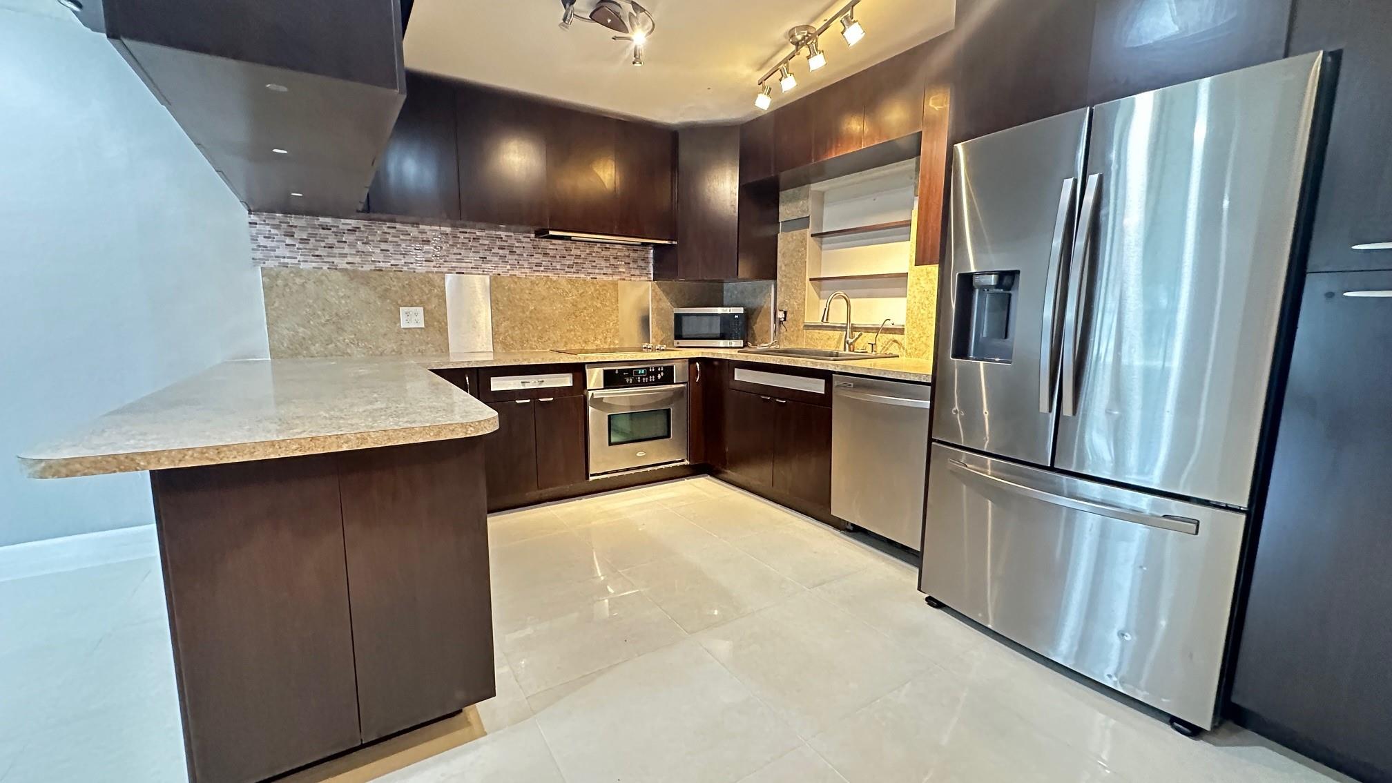 Woodland Villas 73-34 B - Residential Lease