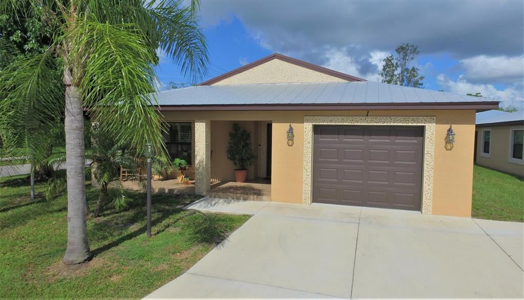 Photo of 1 Barcelona Lane, Port Saint Lucie, FL 34952 (MLS # R10732382)