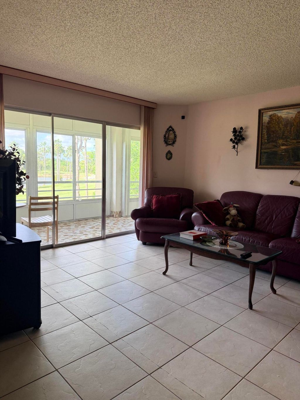 Photo of 3836 Via Poinciana #306, Lake Worth, FL 33467 (MLS # B26025065)