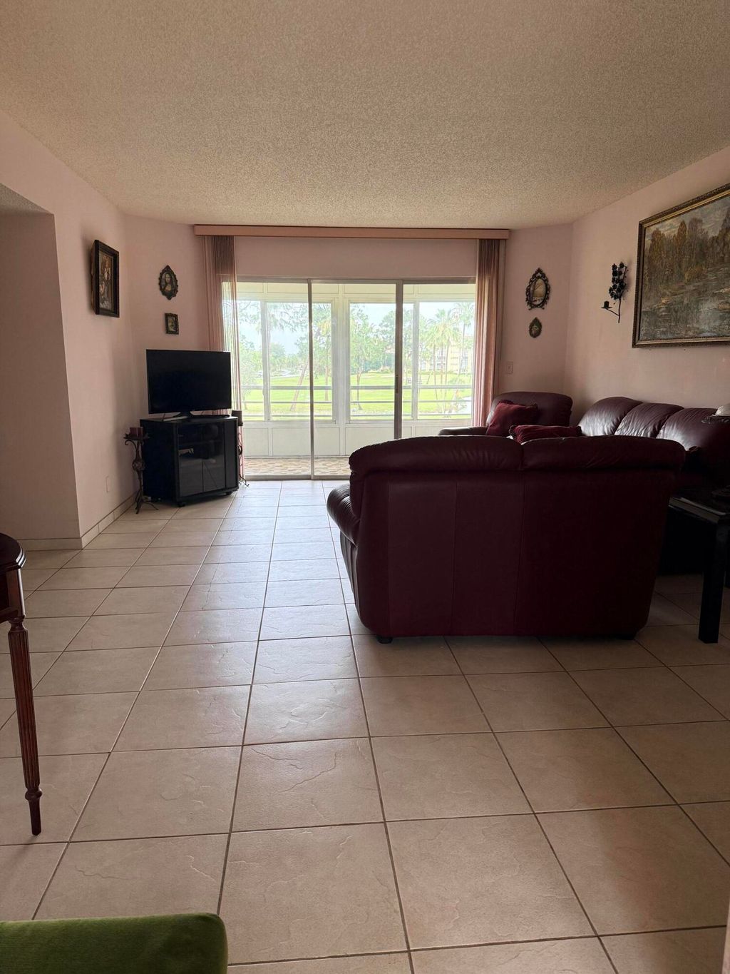 Photo of 3836 Via Poinciana #306, Lake Worth, FL 33467 (MLS # B26025065)