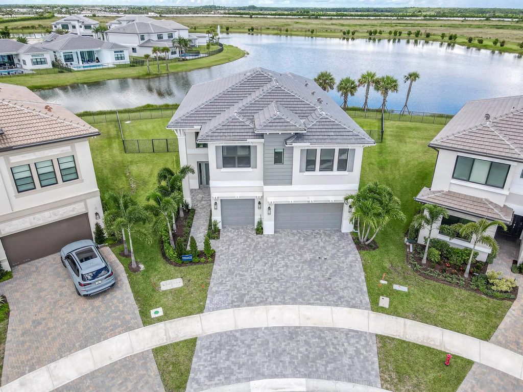 Photo of 10077 Heron Flock Drive, Palm Beach Gardens, FL 33412 (MLS # R11125327)