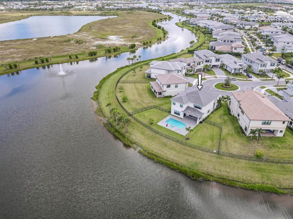 Photo of 10077 Heron Flock Drive, Palm Beach Gardens, FL 33412 (MLS # R11125327)