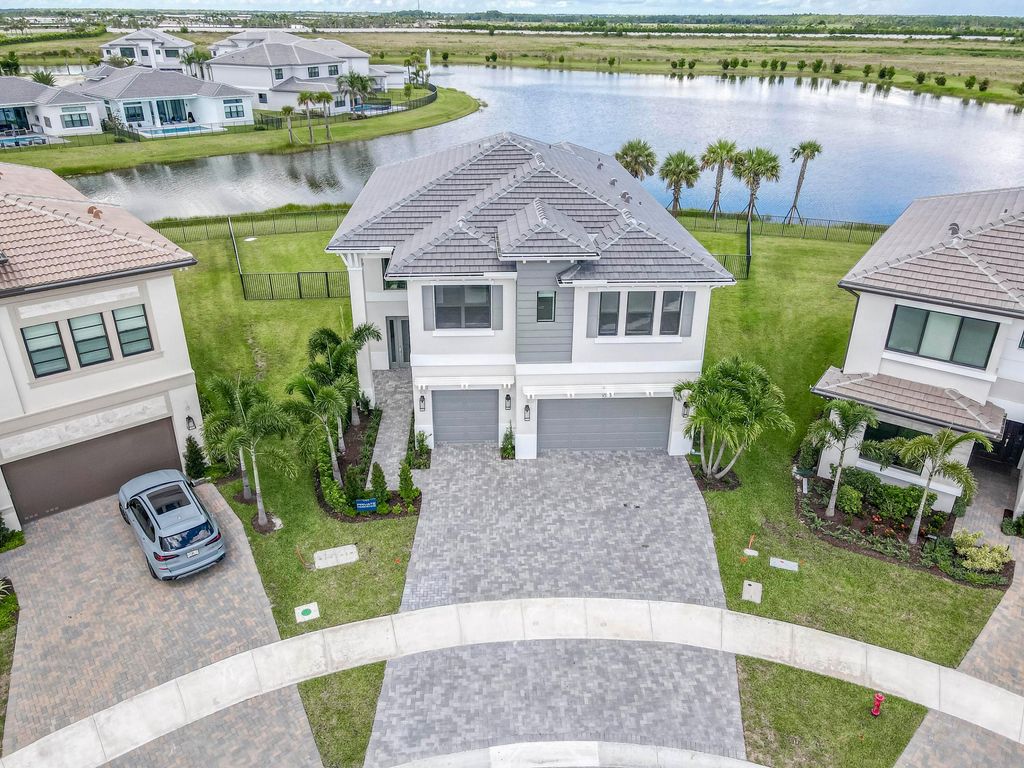 Photo of 10077 Heron Flock Drive, Palm Beach Gardens, FL 33412 (MLS # R11125327)