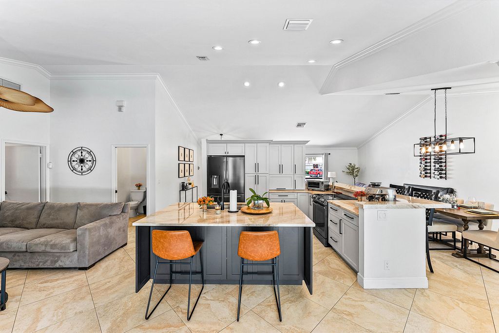 Photo of 9847 Sun Pointe Drive, Boynton Beach, FL 33437 (MLS # R11102662)