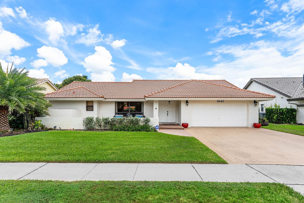 Photo of 9847 Sun Pointe Drive, Boynton Beach, FL 33437 (MLS # R11102662)