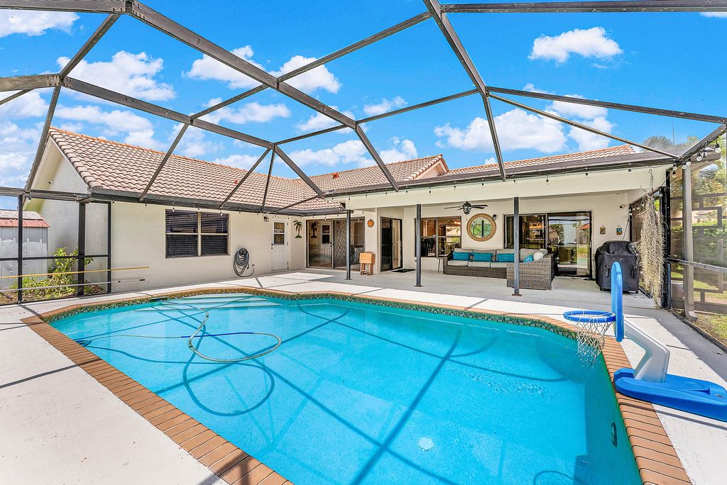 Photo of 9847 Sun Pointe Drive, Boynton Beach, FL 33437 (MLS # R11102662)