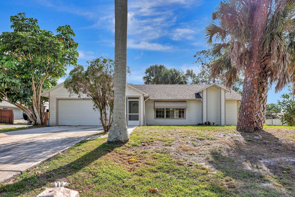 Photo of 4433 SW Bonney Street, Port Saint Lucie, FL 34953 (MLS # R10972240)