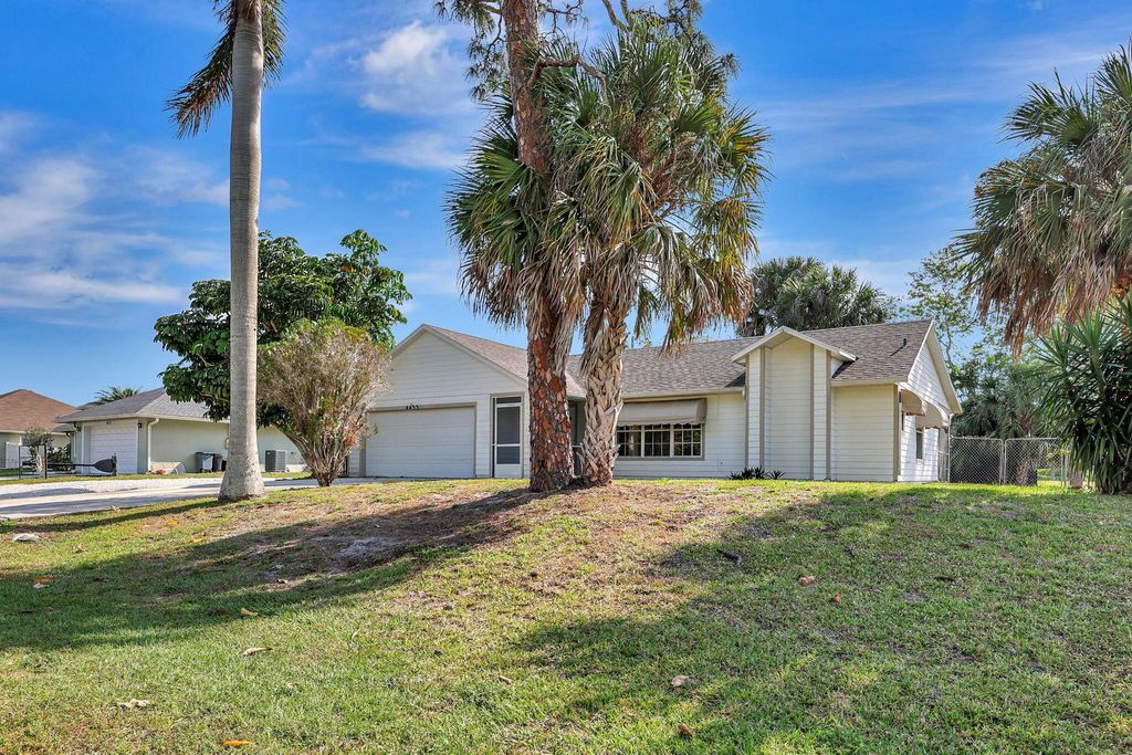 Photo of 4433 SW Bonney Street, Port Saint Lucie, FL 34953 (MLS # R10972240)