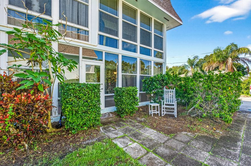 The best value on the Indian River Lagoon — and the best seat in the house. This 986 SF, 2-bed, 2-bath first-floor corner unit in Pinetree Village puts you steps from the riverfront park where dolphins play daily — and directly across from Vero's most transformative development, the Three Corners waterfront project. Location doesn't get better at this price. Fresh paint, newer appliances, and a glassed-in enclosed porch make this move-in ready. Pool steps from your door, tennis courts, lush garden setting, all-ages welcome. Roof assessment already paid — no surprise costs. Ideal primary residence or future rental. Note: no leasing permitted for first 18 months. Walk to Miracle Mile. Minutes to the beach. Vero Beach living at its most affordable — and most central. No leasing first 18 months. Roof estimate is paid.