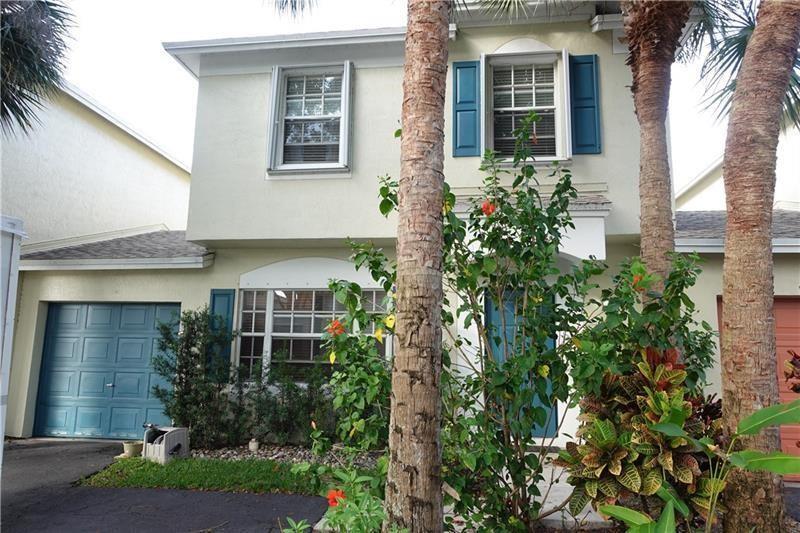 Immaculate 3bed /2.5 bath townhome w/ att. garage. STAINLESS STEEL APPLIANCE , opens to a bright living area. Tile downstairs upstairs and WOOD FLOOR